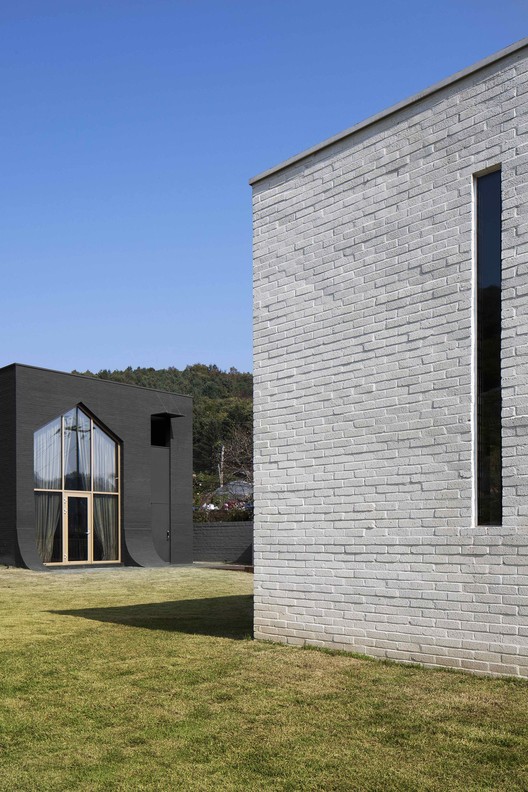 双家庭住宅的极简与古典之美-14