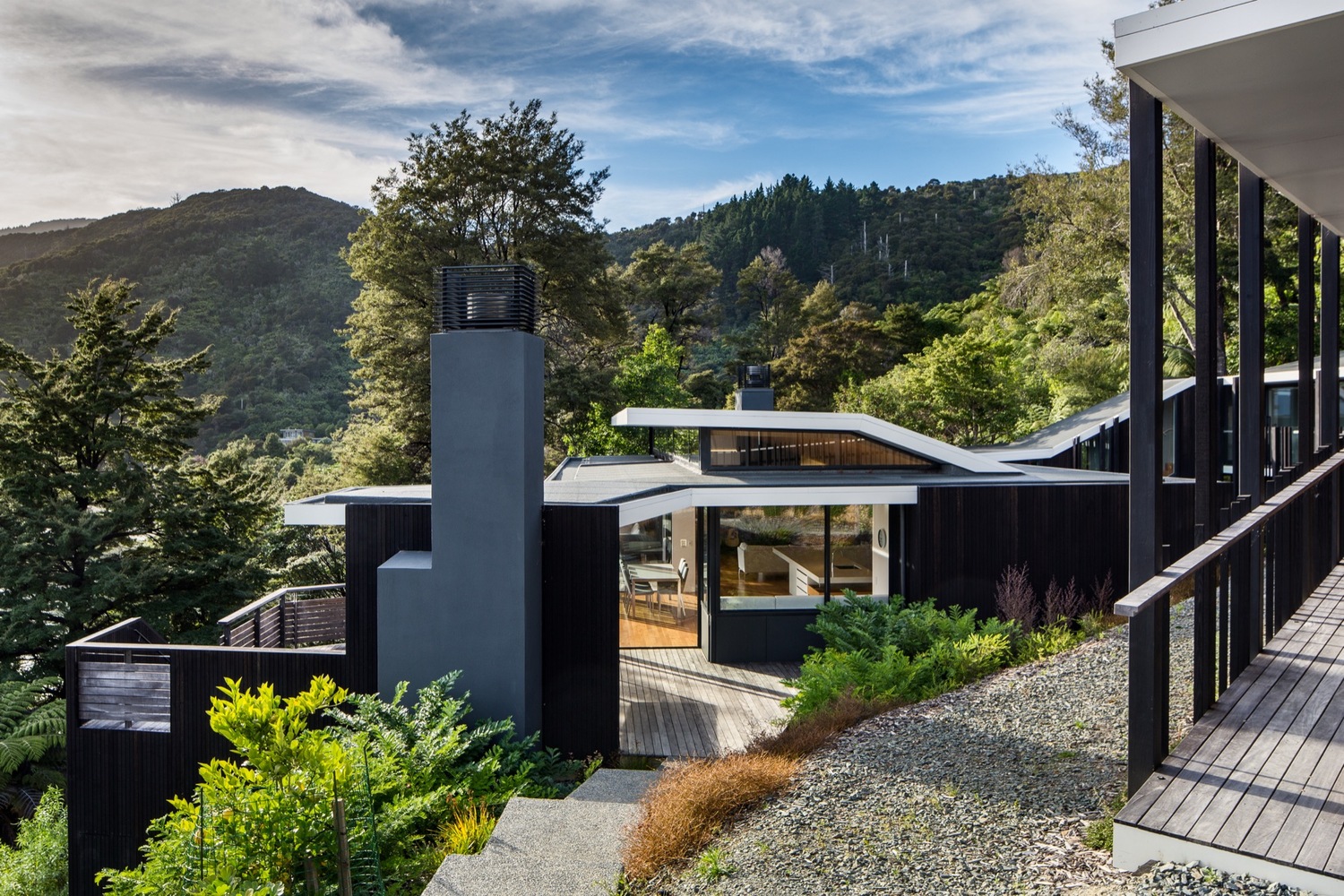 新西兰 Moetapu 度假屋 | 嵌入丛林的折叠式建筑-49