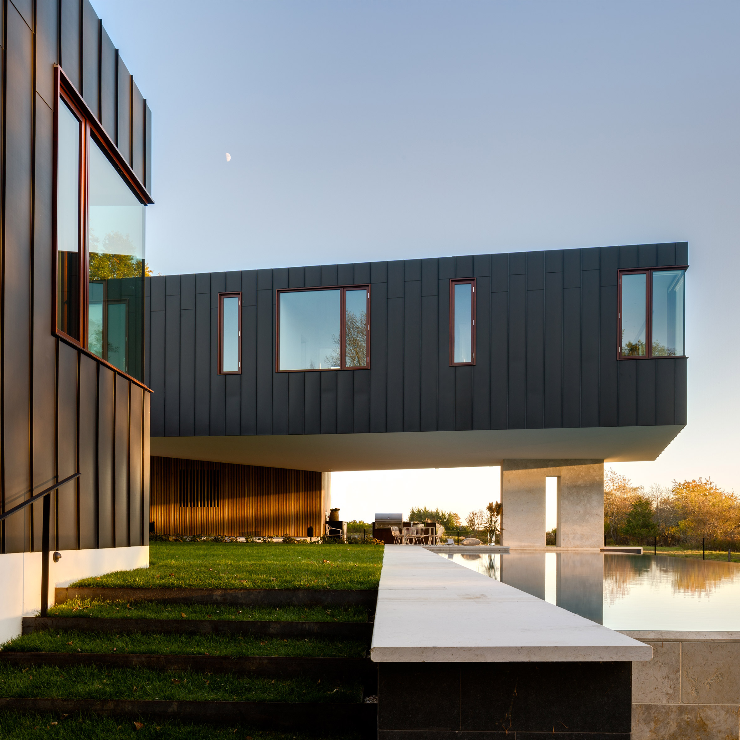 Office of Architecture elevates zinc-clad Hamptons home above a floodplain-0
