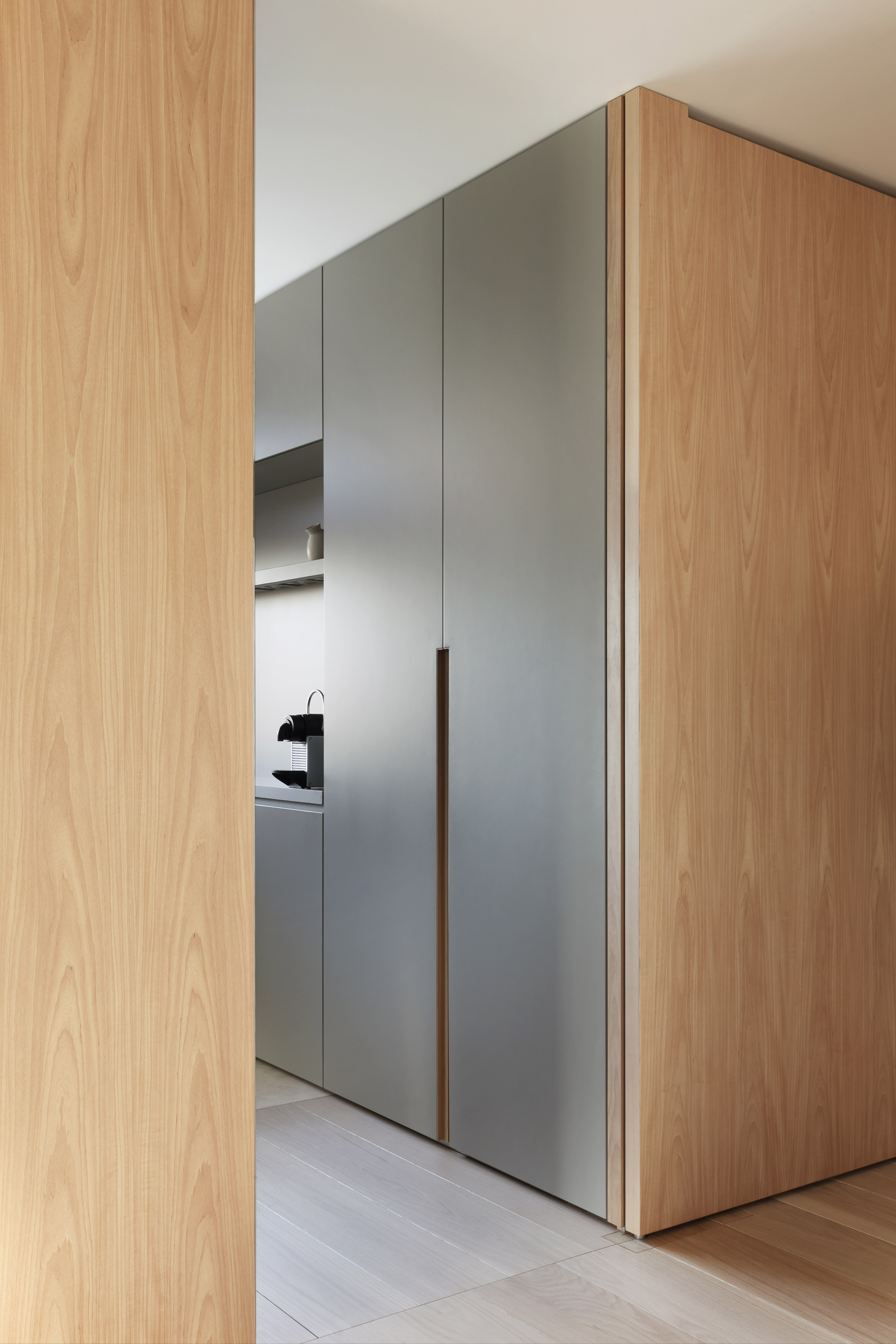 Built-in storage redefines layout for apartment overhauled by MWAI-11