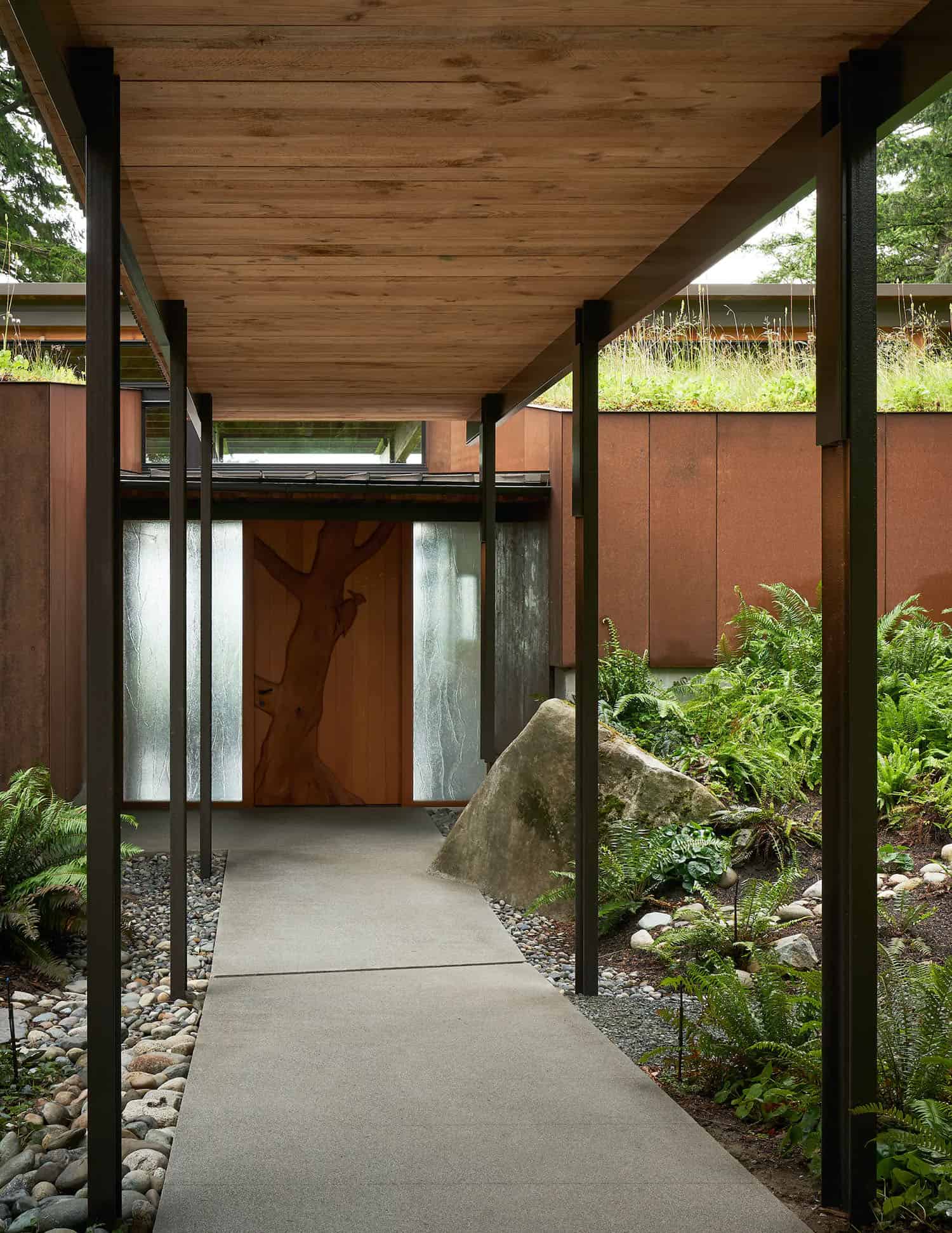 An intimate retreat tucked into a forest overlooks serene Puget Sound-11