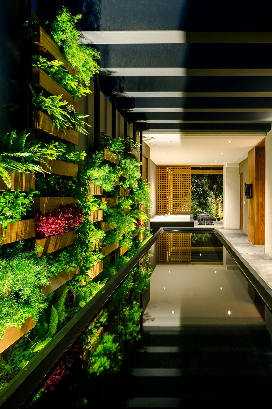 Jardin Apartment Provides a Close Connection of Living Spaces with Patios and Interior Gardens-30