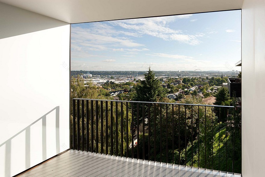 Modern Vertical House Accessed by a Steel Pedestrian Bridge-12