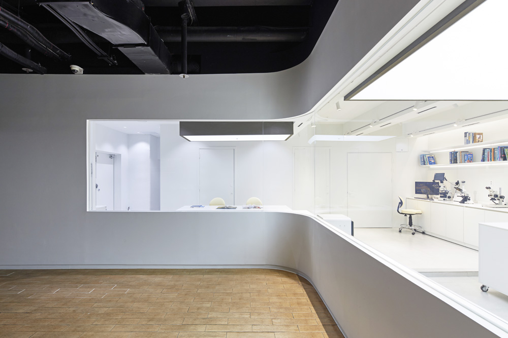 极简白调，25 平米的精致 COWA 展示空间-5