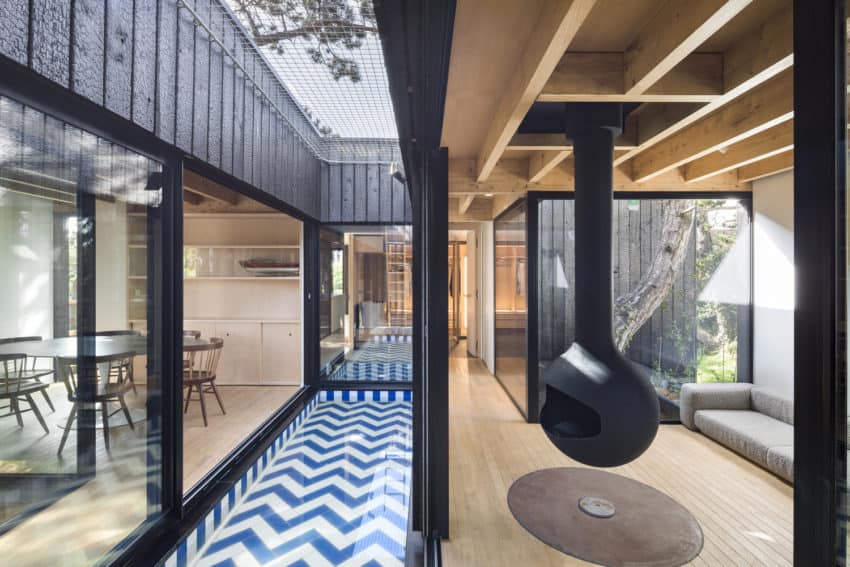 Uniquely Treehouse inspired house by Atelier Victoria Migliore features stilts, swings, and climbing nets just like the real thing-11