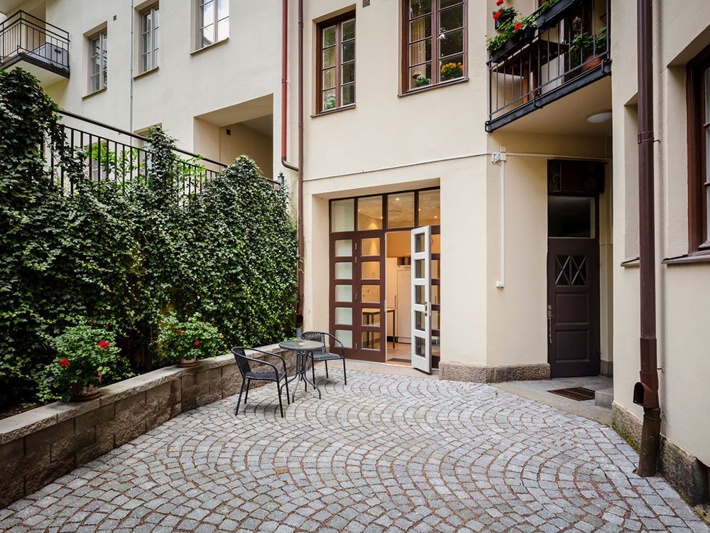 哥德堡明亮宽敞的顶层公寓设计-34