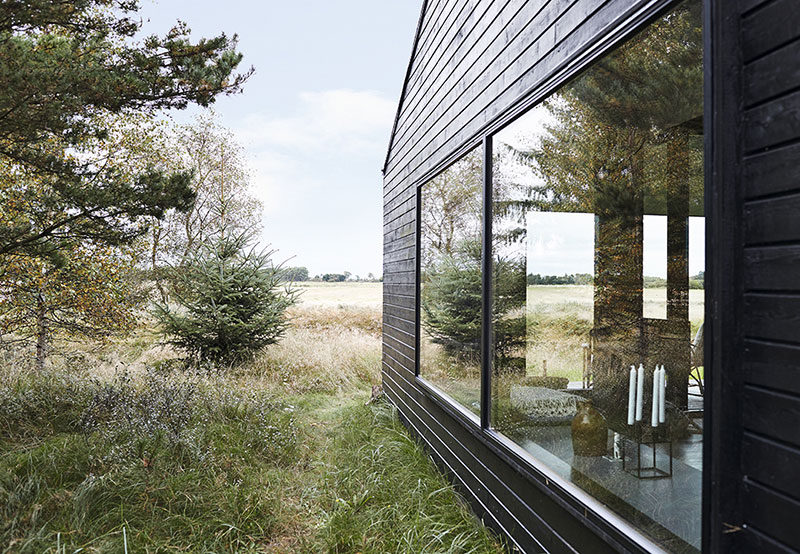 丹麦沙丘上的和谐自然小屋-9