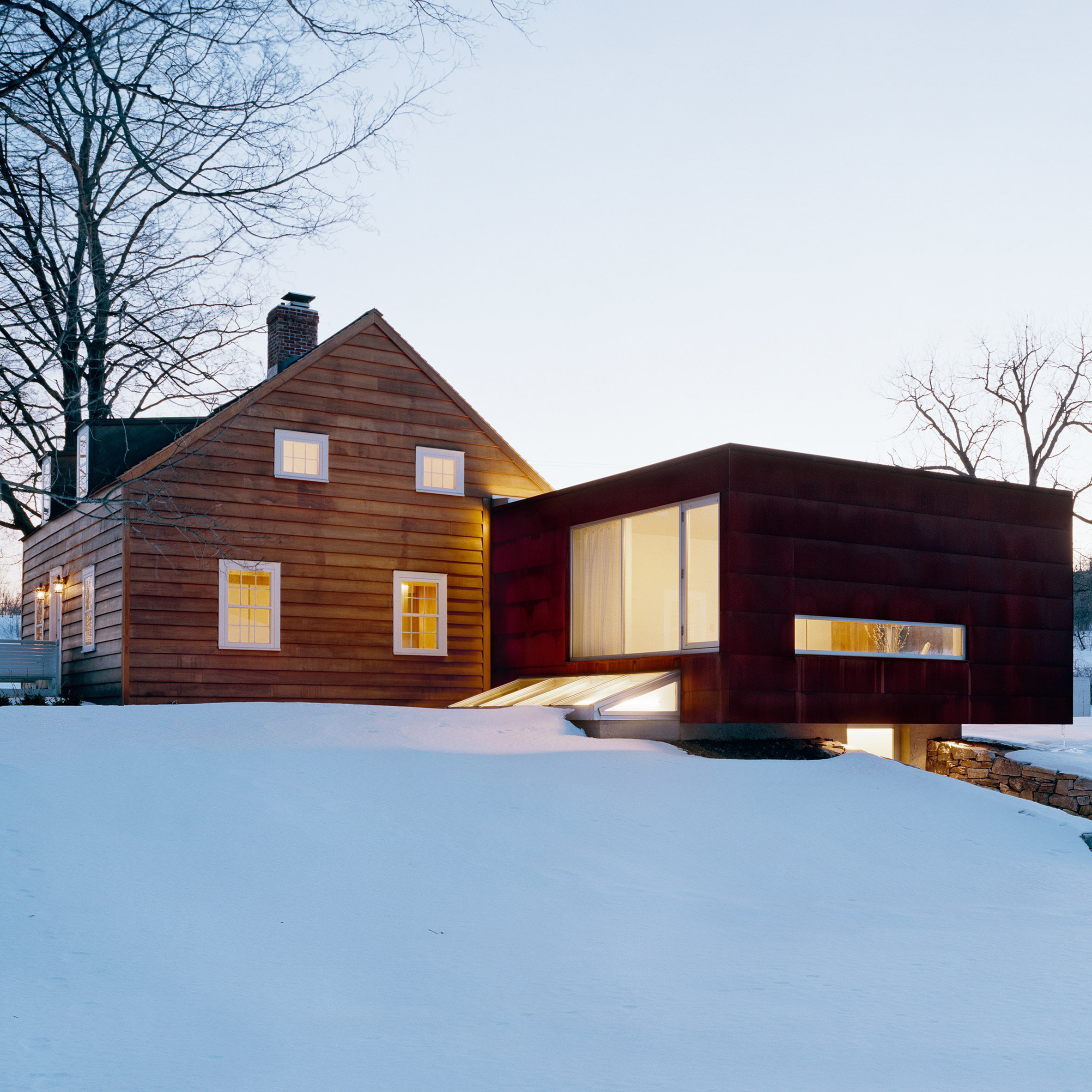 Messana O'Rorke Architects extends colonial New York homestead with weathering-steel annex-0