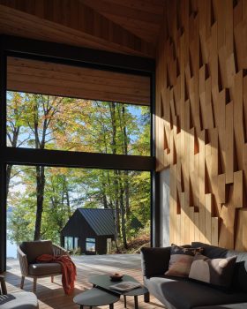 Barbora Vokac Taylor includes viewfinder windows on black Ontario cabin