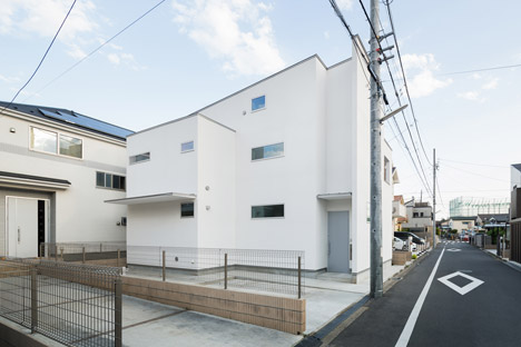 House K by Yuji Kimura Design conceals terraces behind a tall wall-6