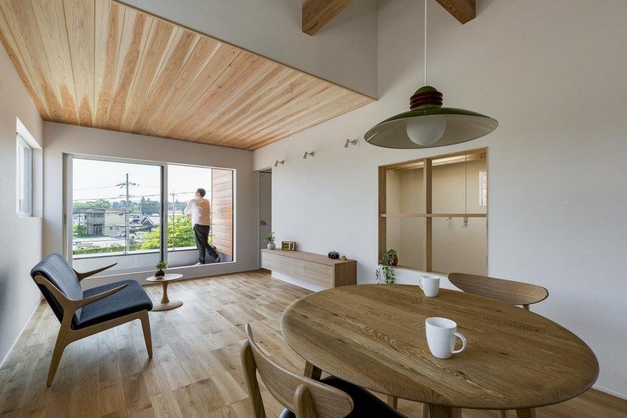 Box-Shaped Japanese Home with Warm Minimalist Interior Design-0