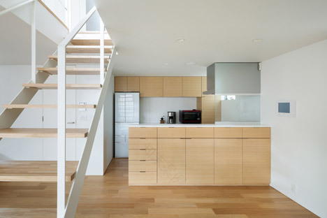 House K by Yuji Kimura Design conceals terraces behind a tall wall-14