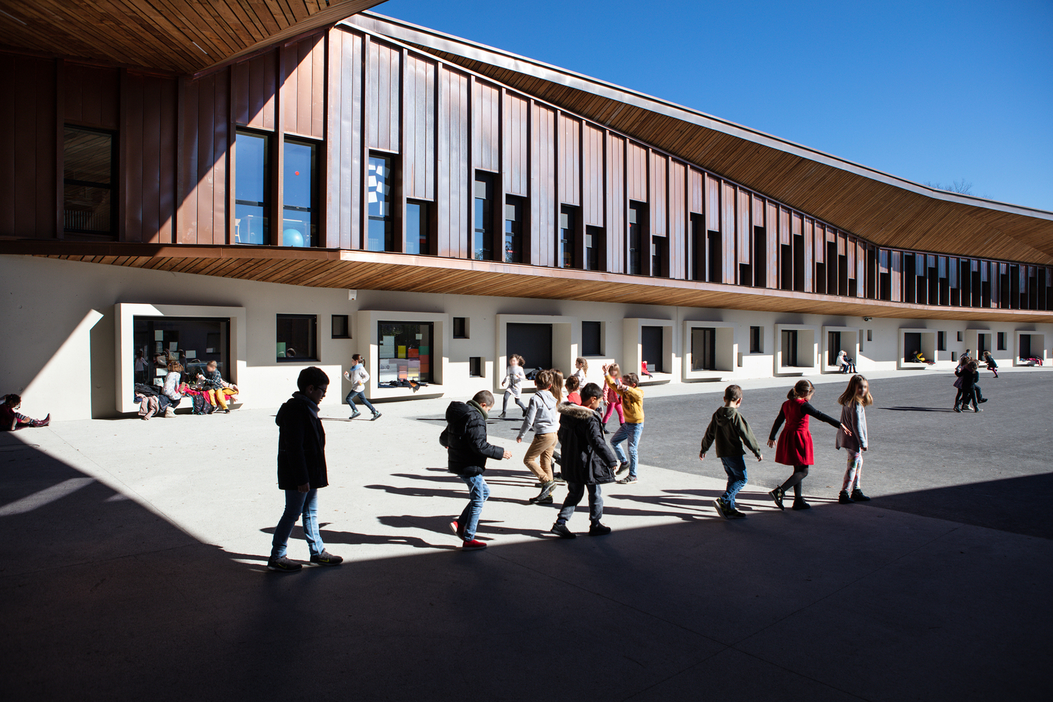 法国北佩利克学校 · 融入环境的创意建筑-12