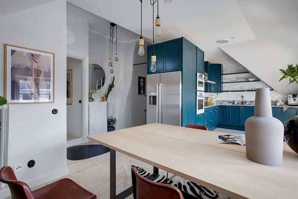 瑞典优雅公寓设计,浪漫倾斜屋顶与现代装饰的完美融合-12