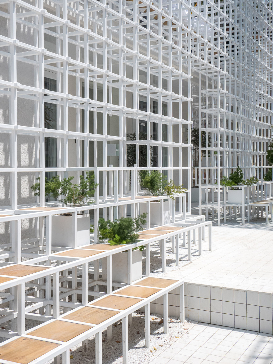 Latticed framework incorporates seating around the edges of Shenzhen hotel and cultural centre-8