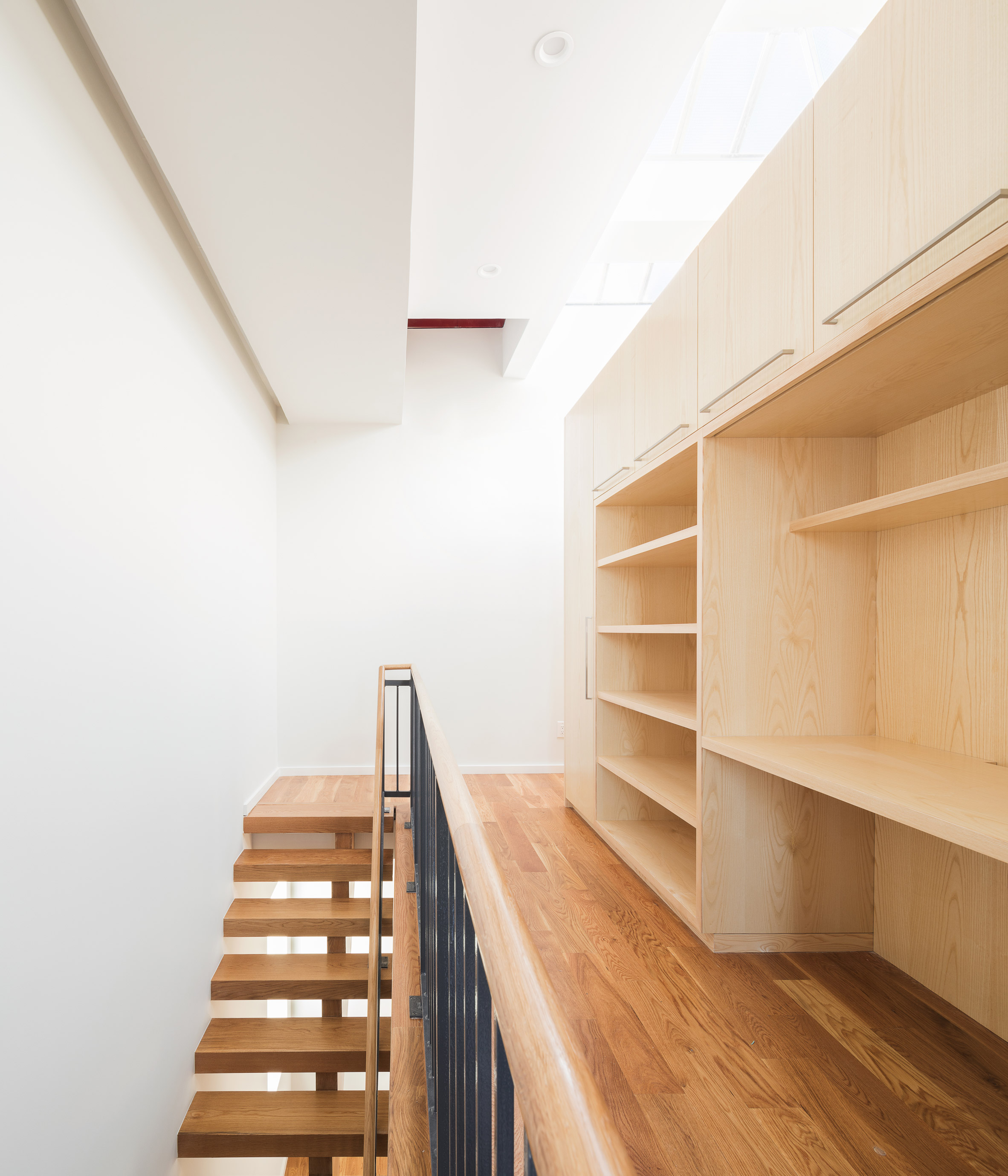 Jeff Jordan pairs white marble and pale pine in Jersey City house renovation-12