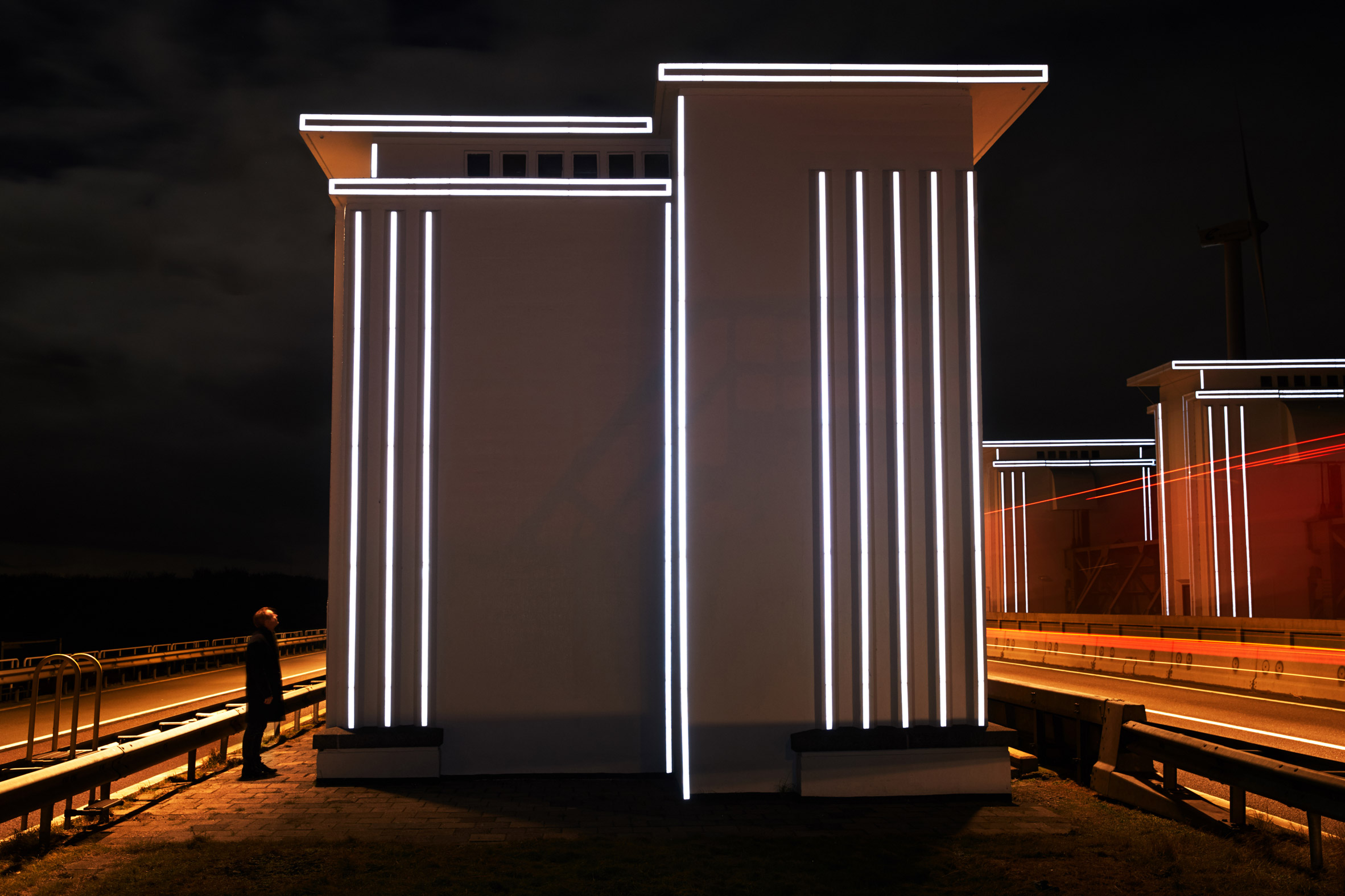 Restored floodgates by Studio Roosegaarde reflect the headlights of cars-5