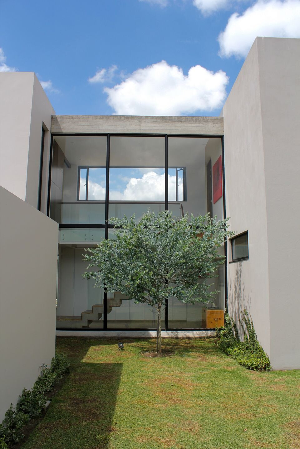 哥伦比亚 L 型别墅 · Campuzano Arquitectos 的室内外一体化设计-27