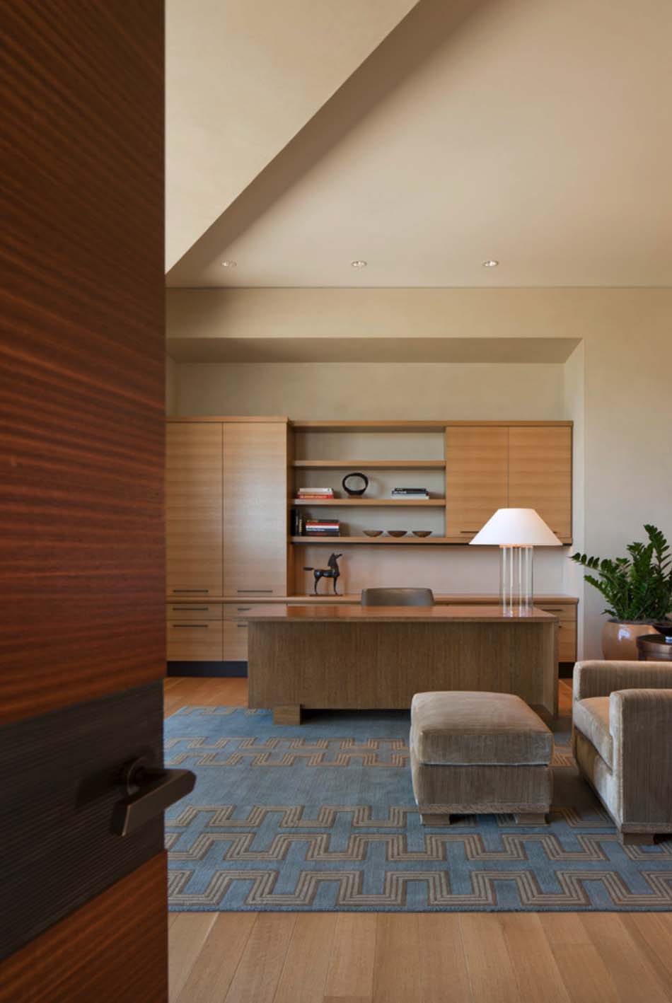 Modern desert home set on a rocky hillside with spectacular city views-16