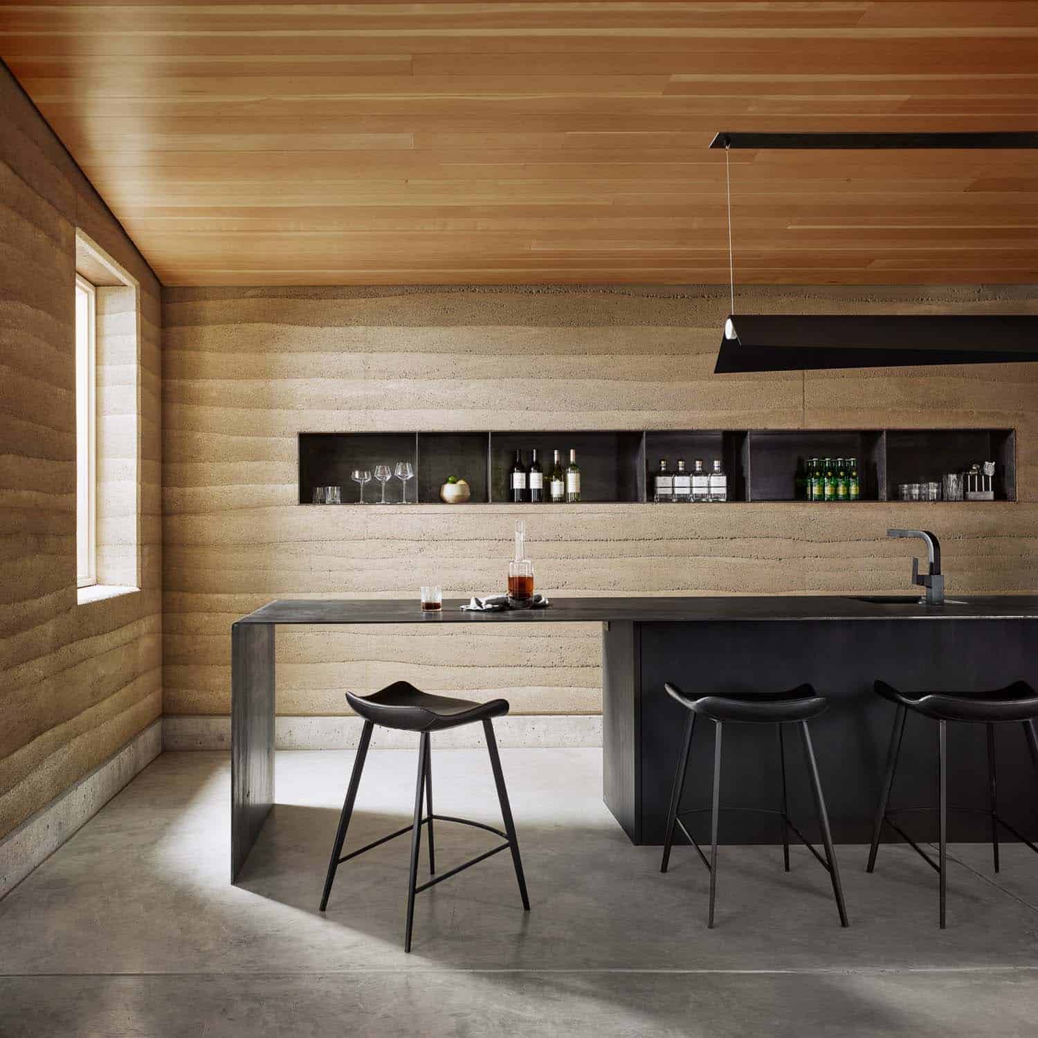 See this remarkable rammed earth house nestled on a Texas ranch-14