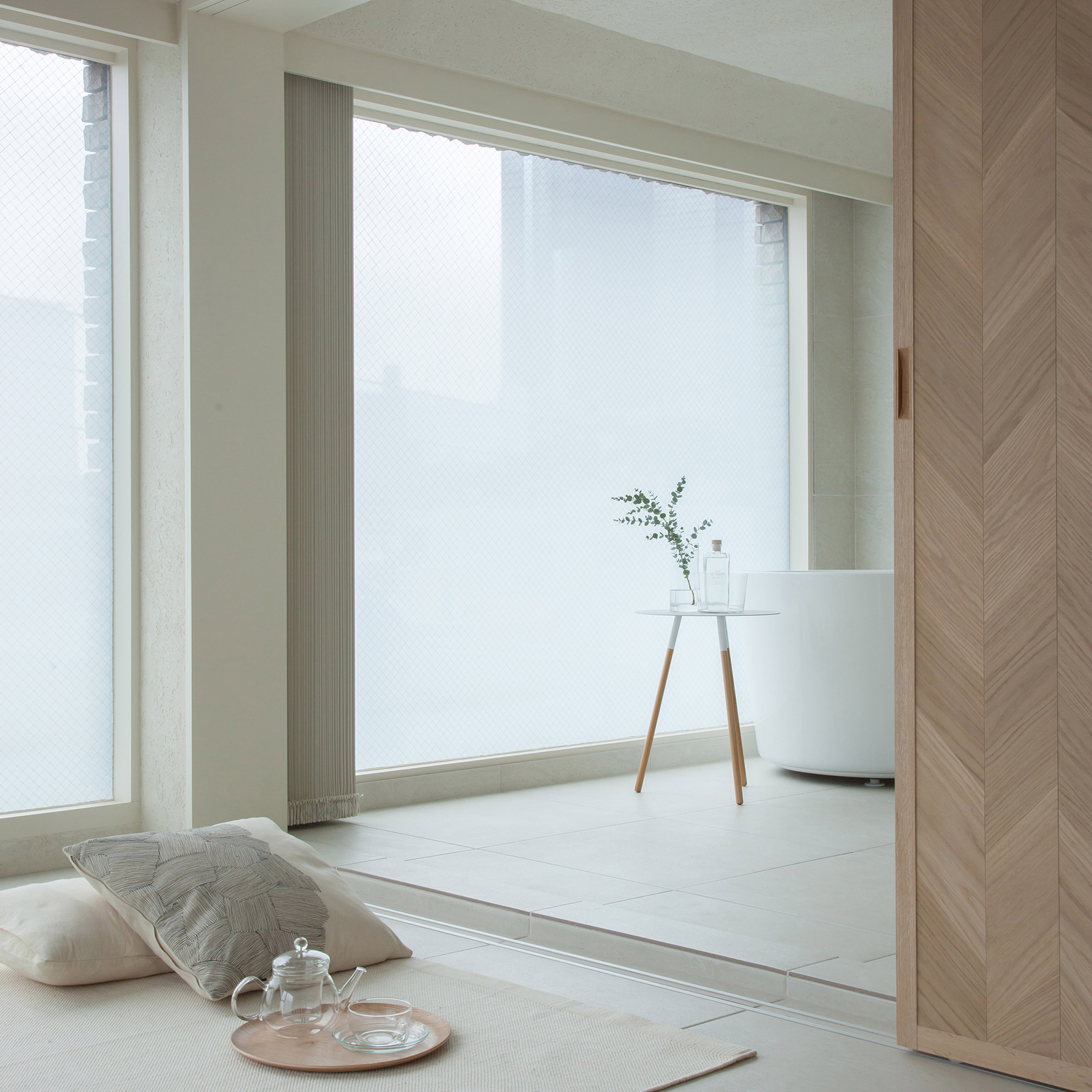 Hiroyuki Ogawa Architects divides up tiny apartment with sliding screens-0