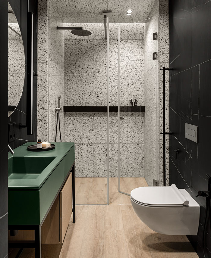 Green L-shaped Kitchen in Kyiv Apartment by Nadya Chabannaya - InteriorZine-7