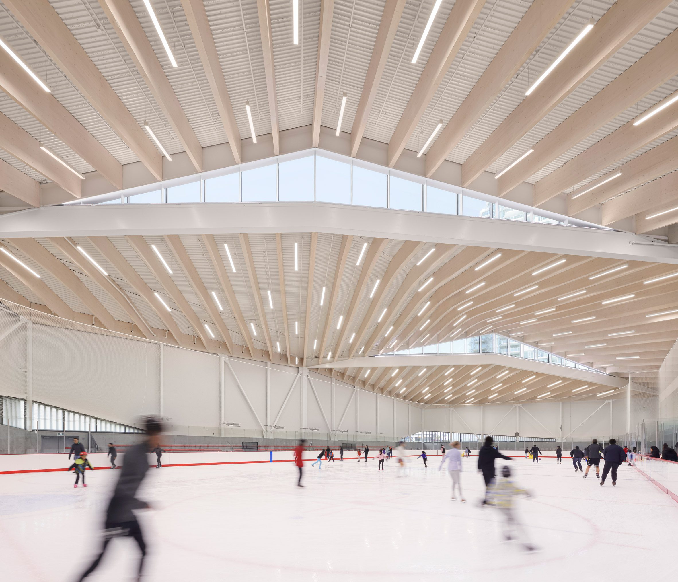 Mass timber adds visual warmth to British Columbia ice arena by HCMA-15