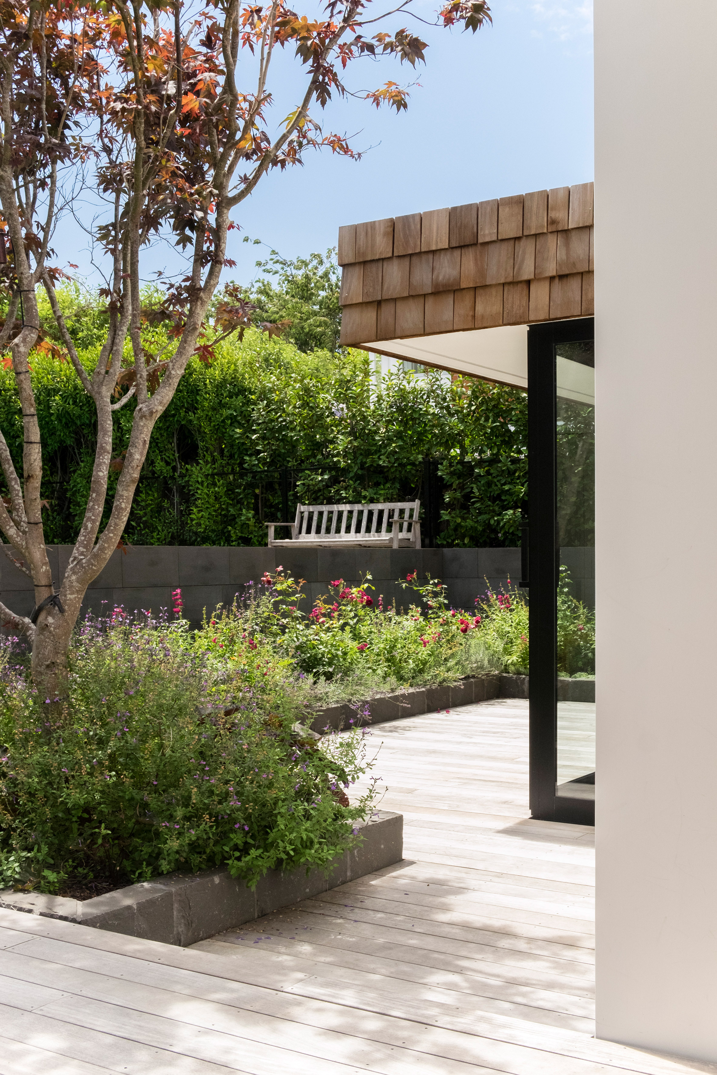Gardens and terraces slot around timber extensions to Auckland house-5