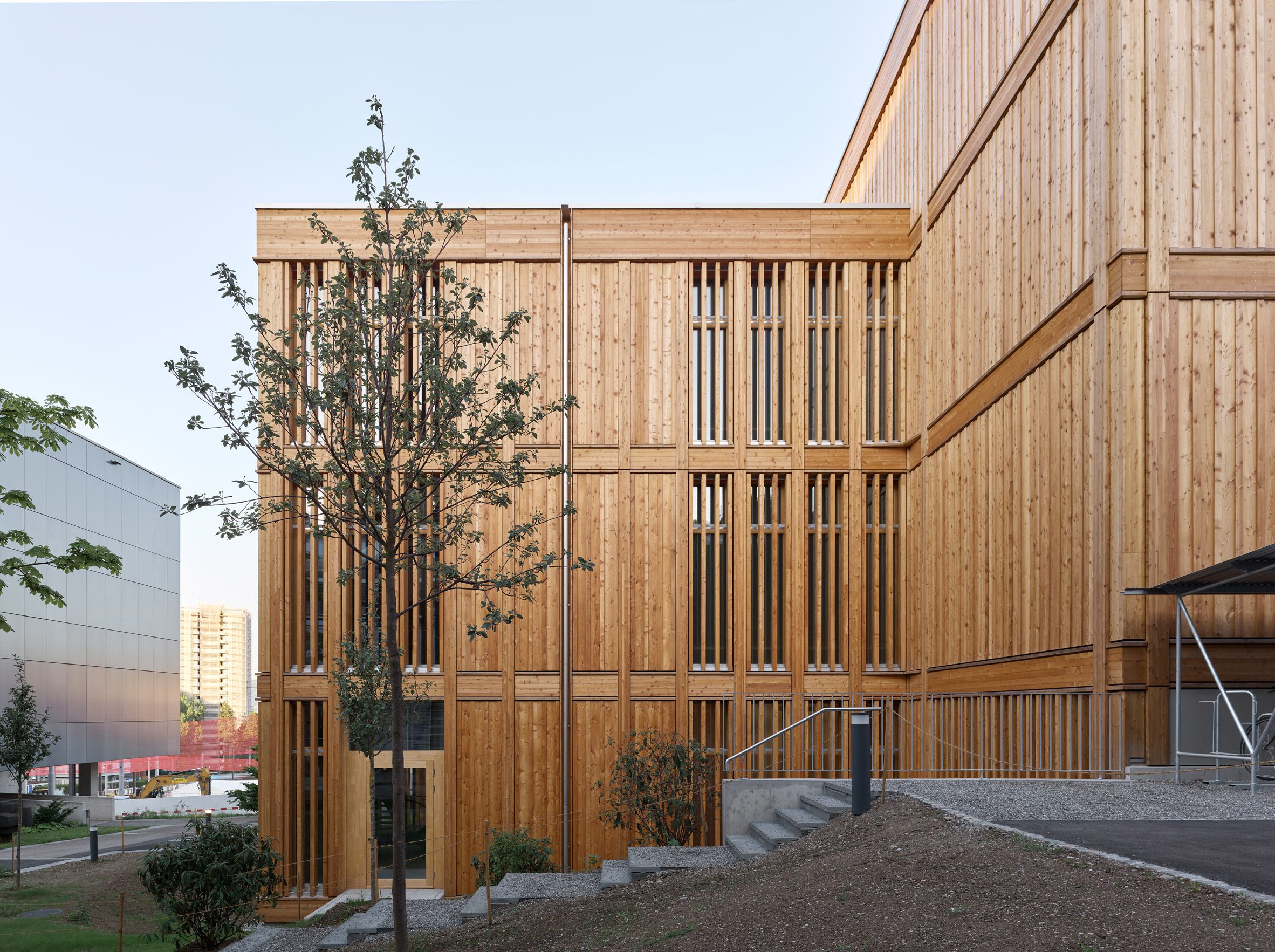 Itten+Brechbühl creates demountable timber sports hall for University of Zurich-7