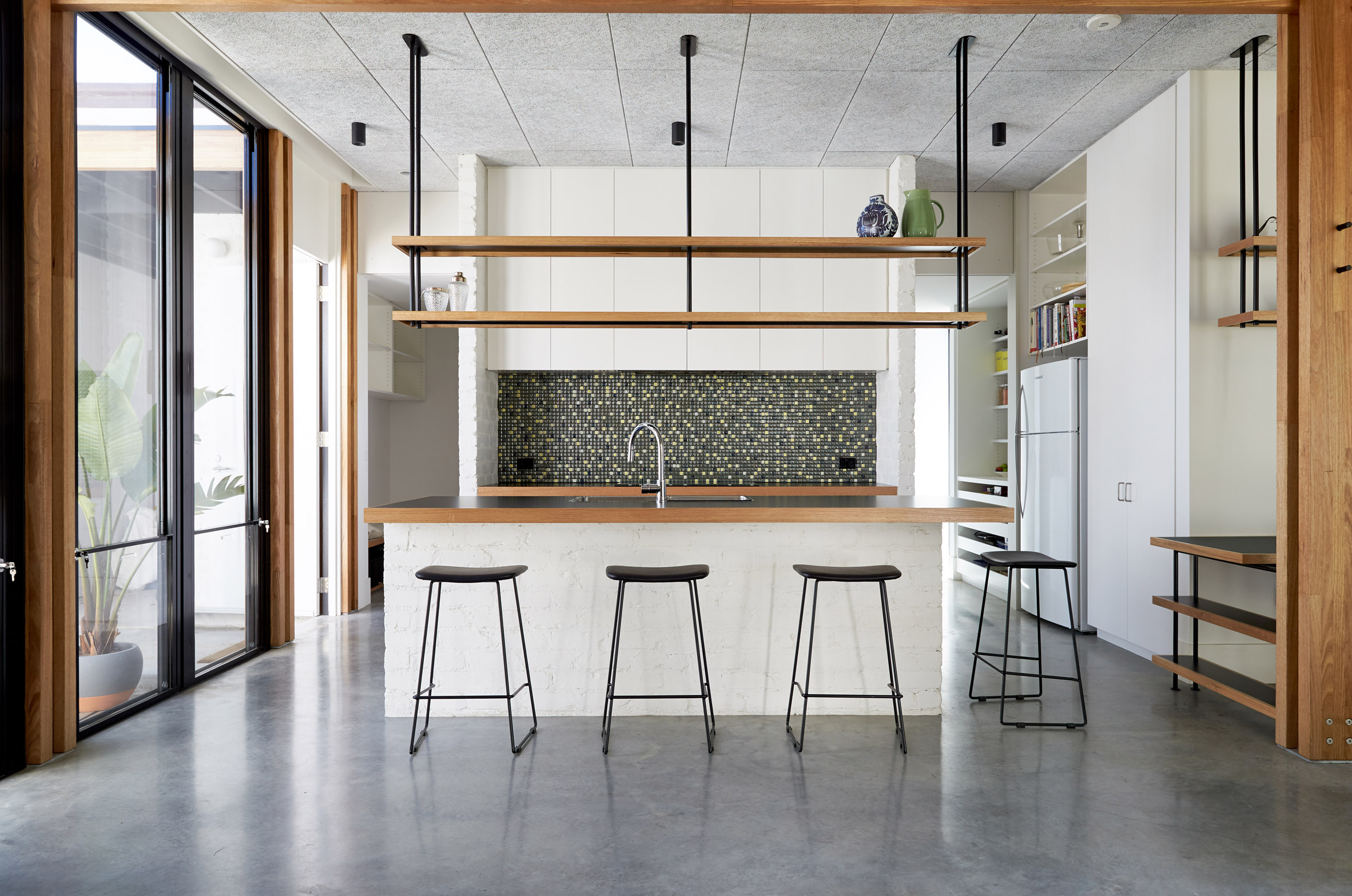 Foomann Architects exposes timber framework in Melbourne bungalow-8