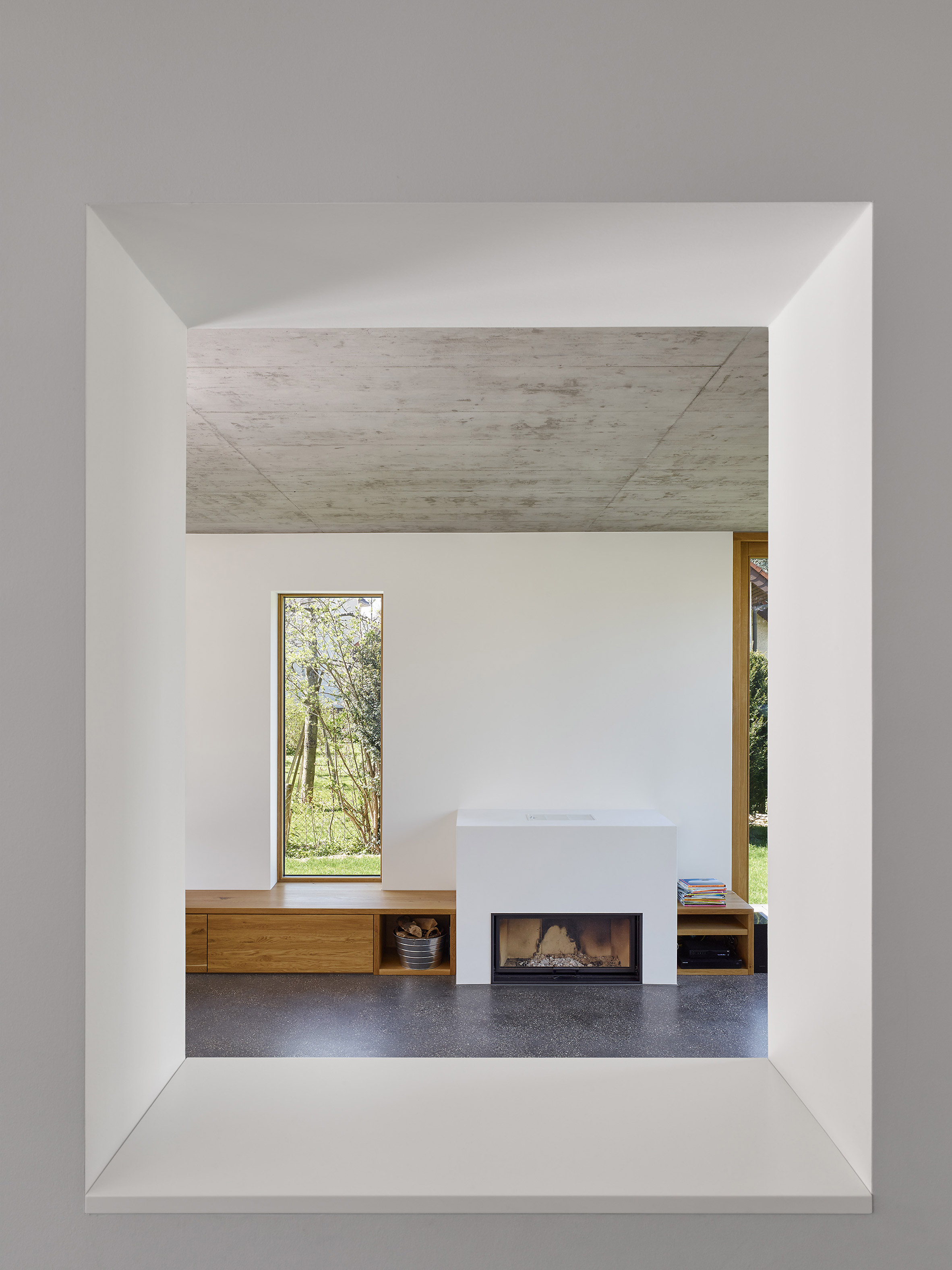 Holzer Architekten adds black extension to 1920s house in Stuttgart-11