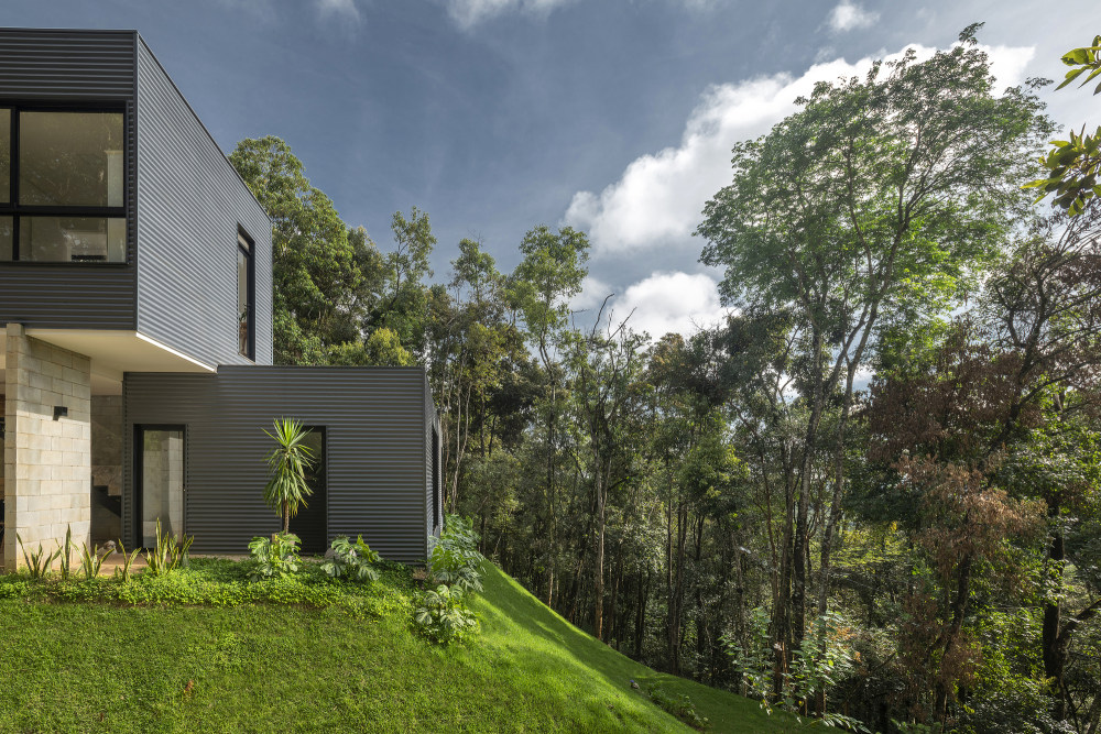 巴西简约住宅设计,融入自然的和谐空间-26