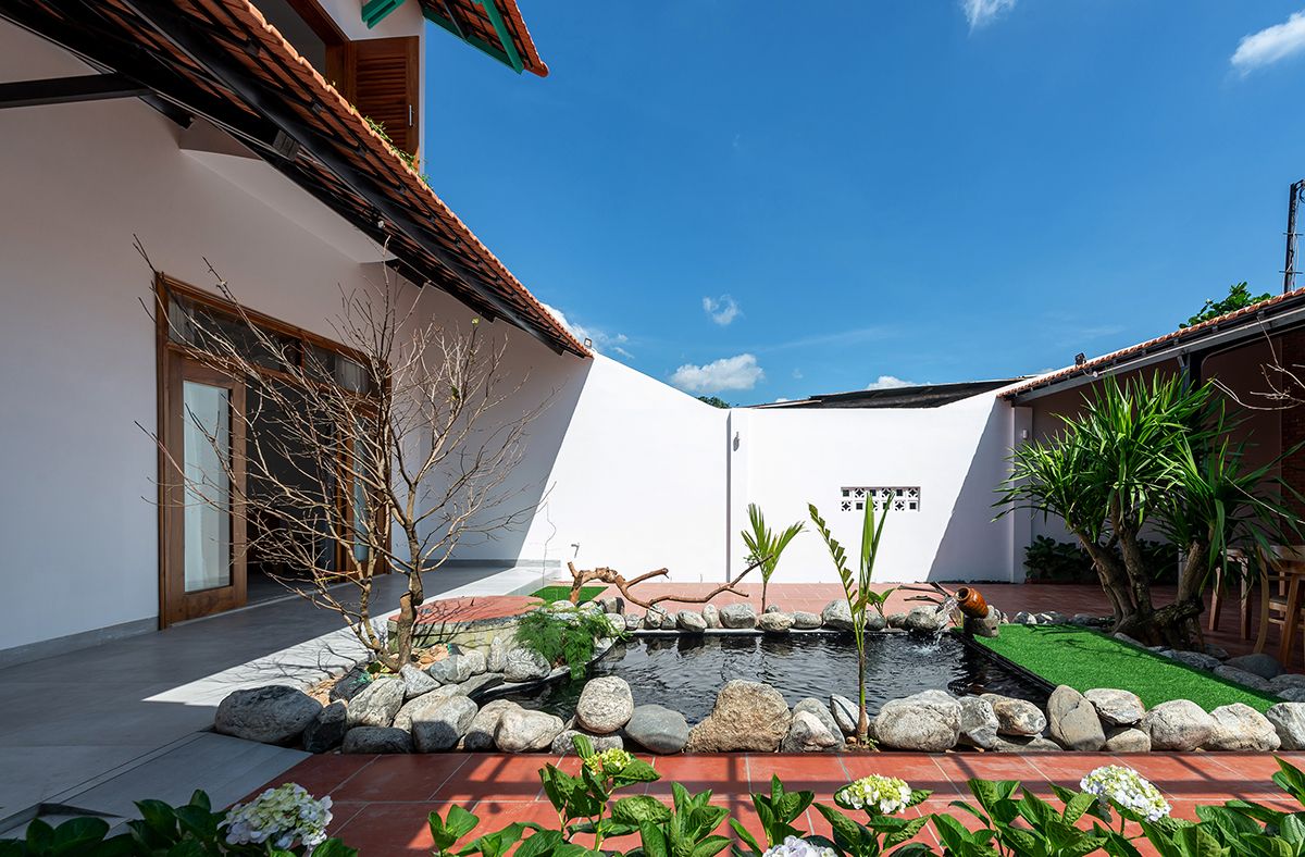 越南 Song Hinh 住宅 | 融合室外景观与室内设计的现代家庭住宅-14