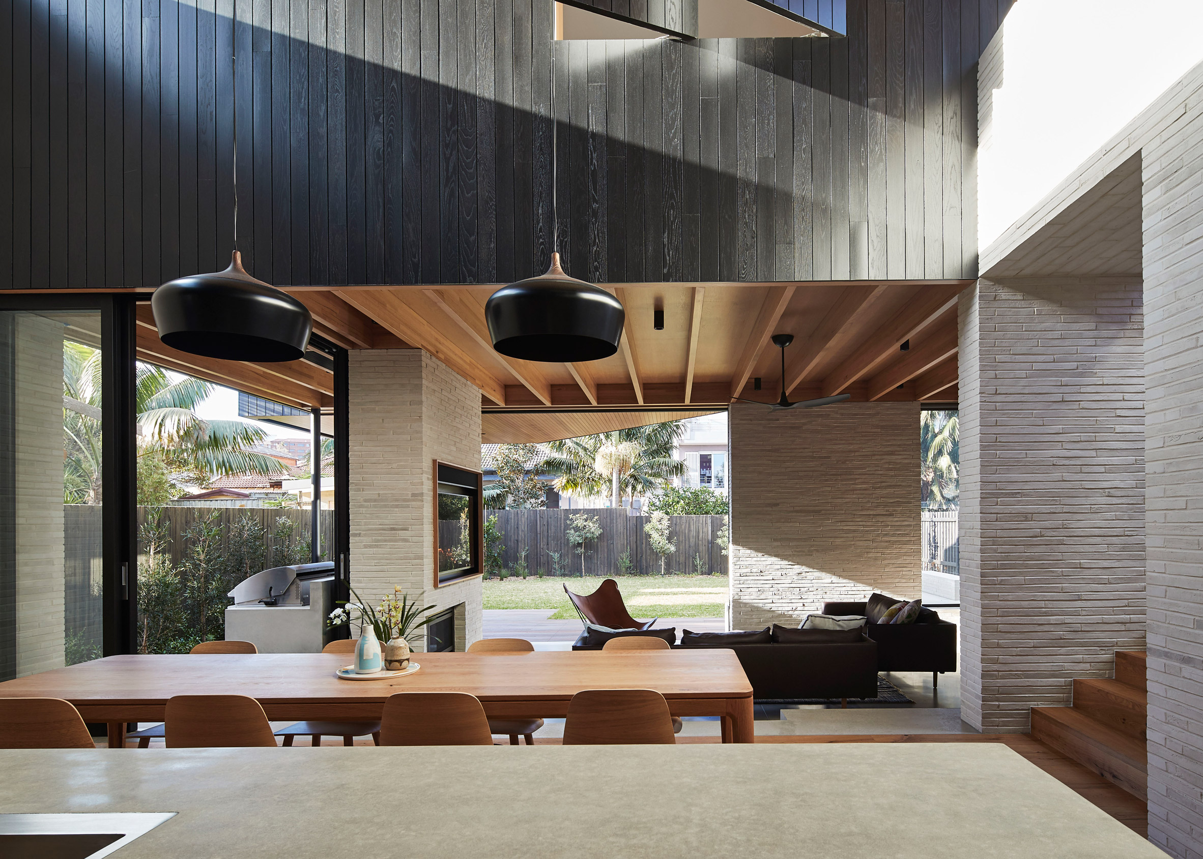 Andrew Burges' Sydney house pairs pale brickwork with blackened wood-2