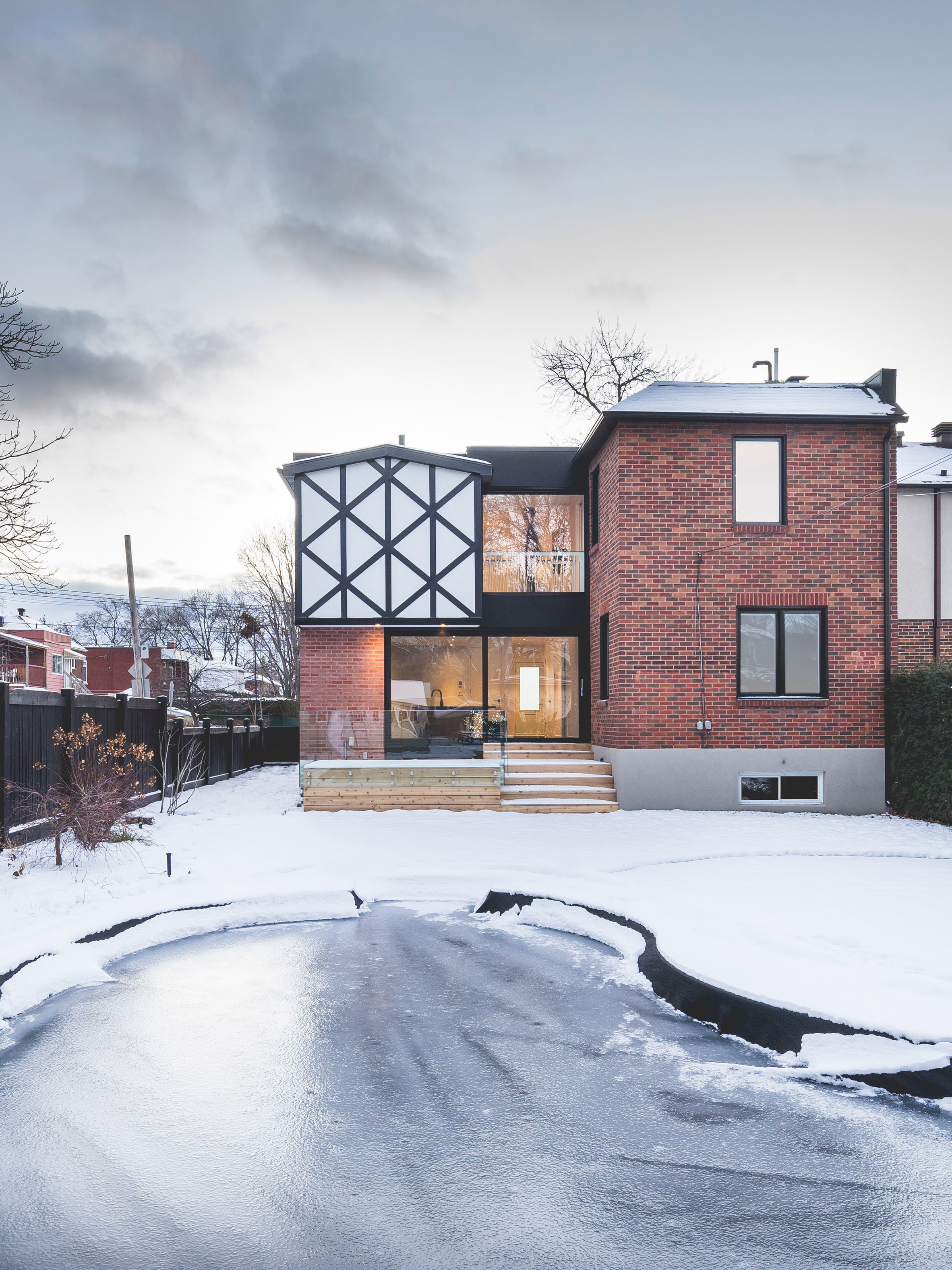 L McComber Architects gives contemporary update to Tudor-style home in Montreal-3