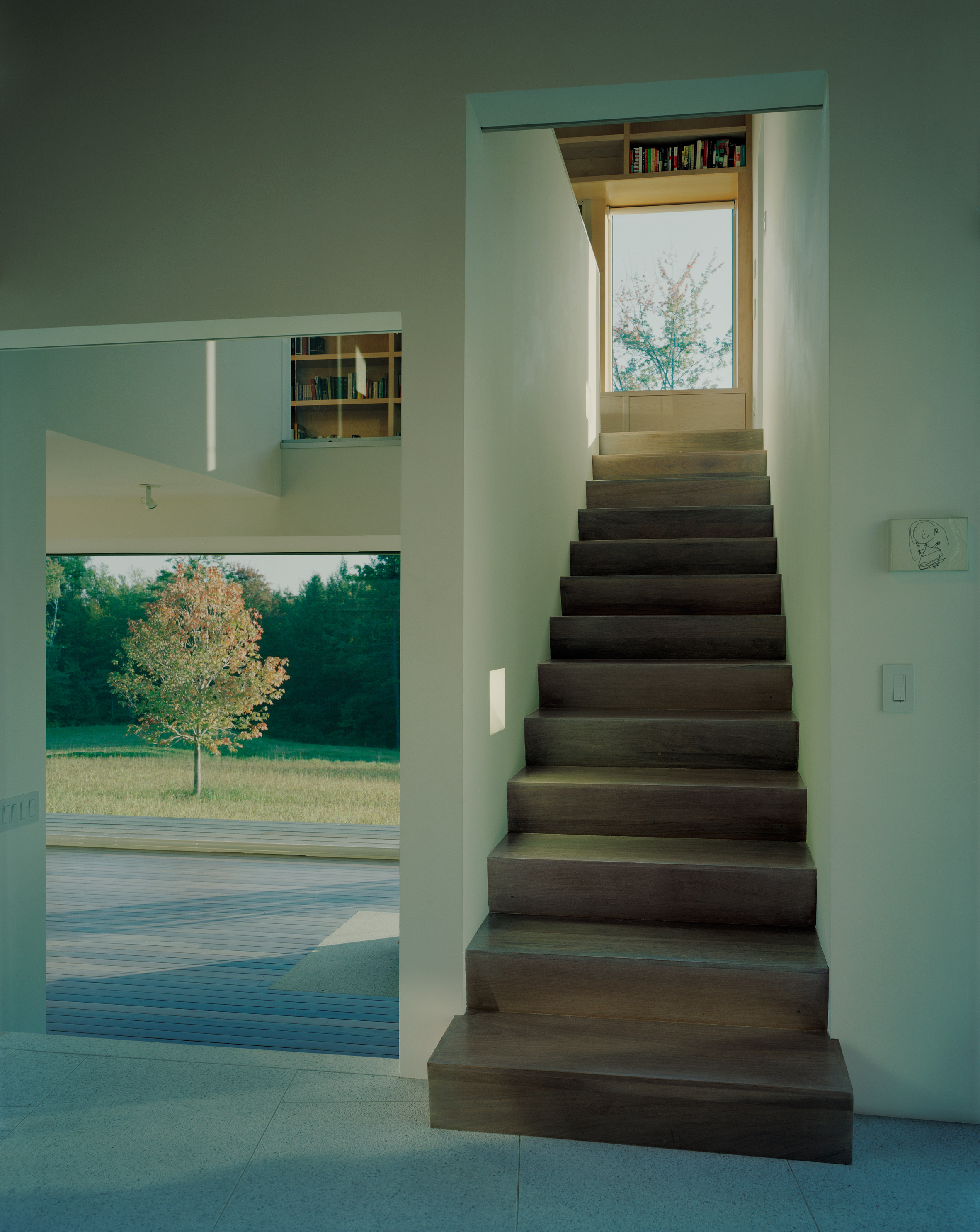 Staggered volumes of house by KSW Architecture frame views of Vermont meadow-12