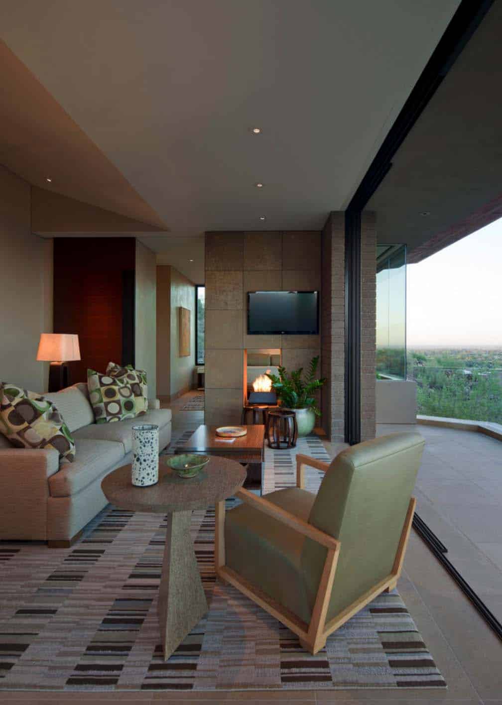 Modern desert home set on a rocky hillside with spectacular city views-20