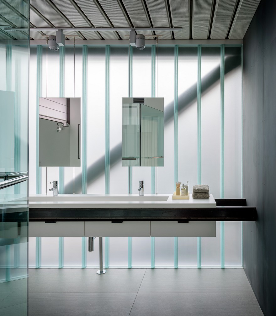 Contemporary Industrial House Features an Expressive Interior of Raw Steel-16