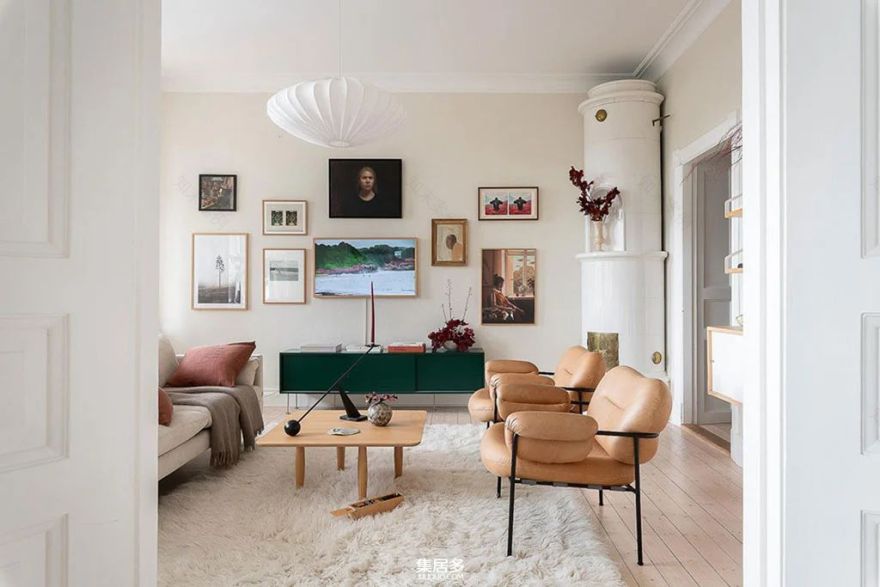 明亮斯堪的纳维亚公寓中的画廊式墙面点亮家居艺术-15