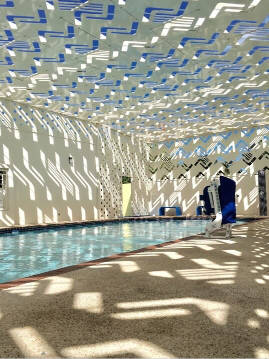 margaritas perforated swimming pool roof FUSTER   Architects-0
