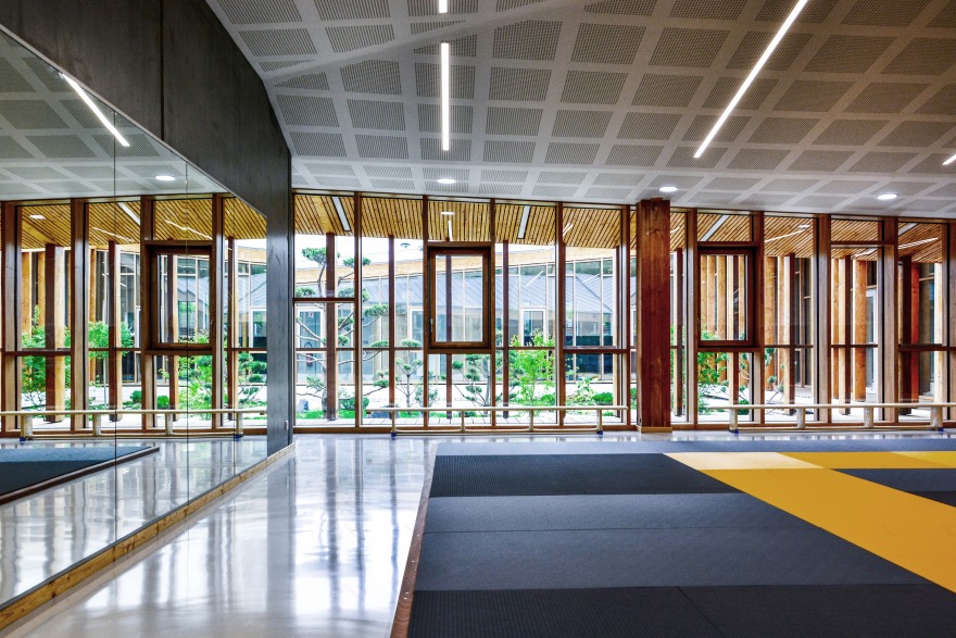 折叠建筑 · 打造城市花园中的宁静武道场-13