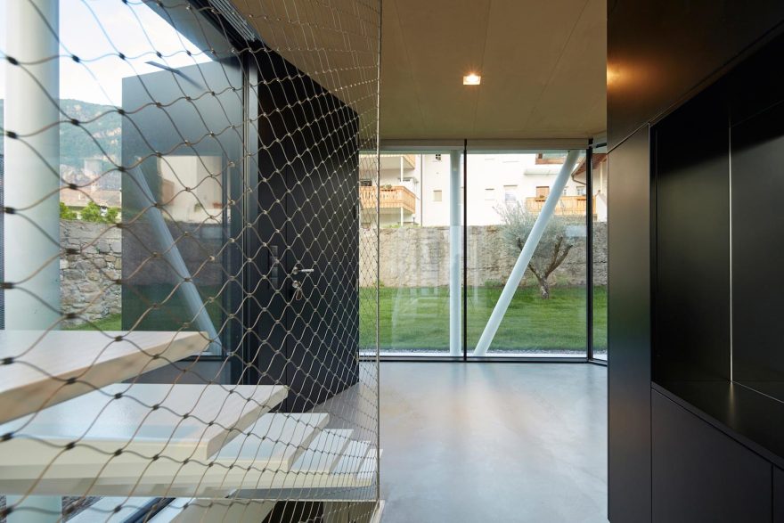 Concrete house uses old walls to create private patio allowing to add full glass walls to the residence CAANdesign Architecture and home design blog-6