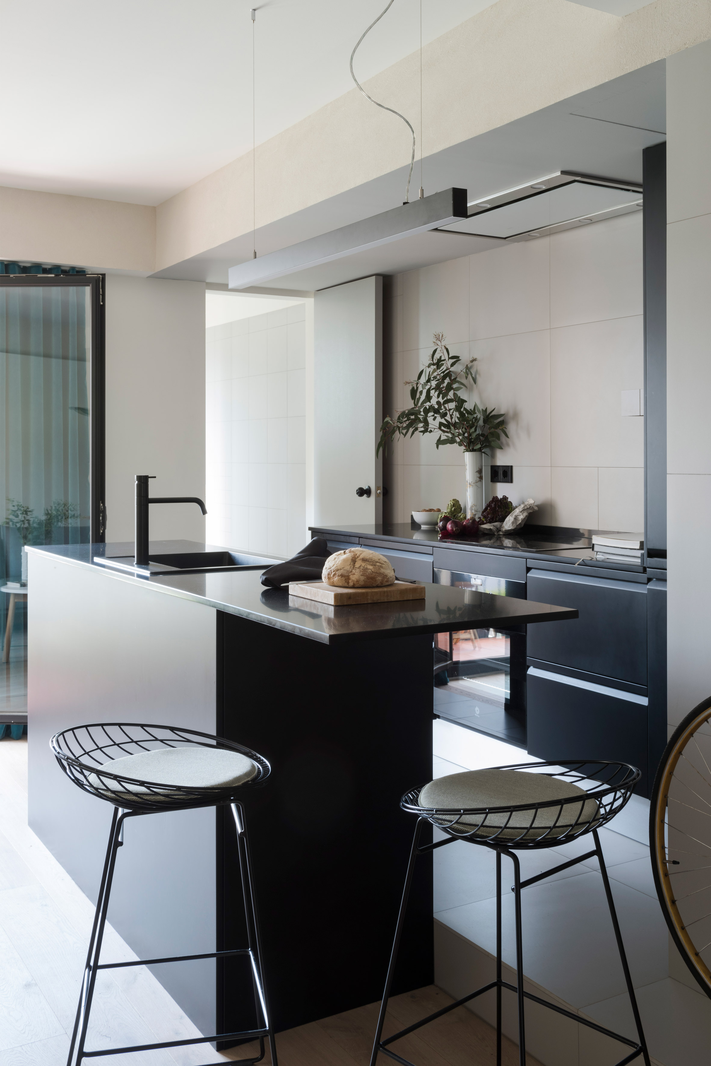 Bespoke storage creates room for bicycles in renovated Barcelona flat-7