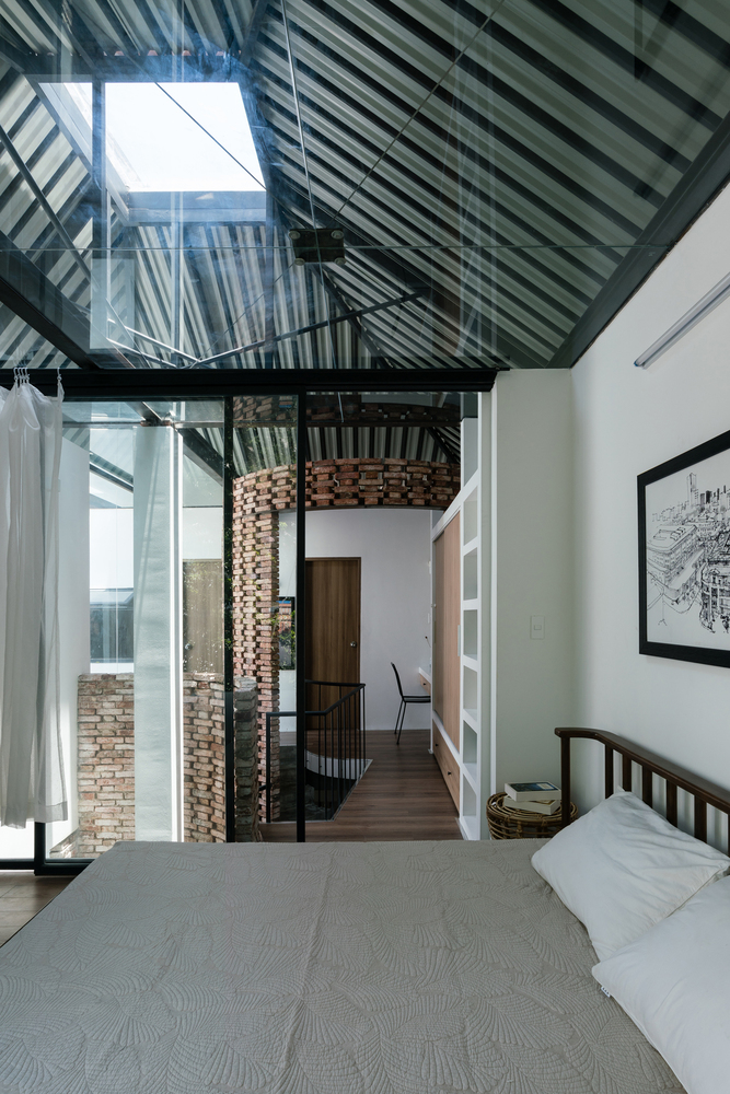 越南热带小院中的“遮阳伞”建筑-61