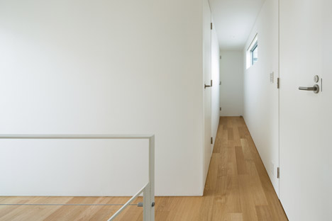 House K by Yuji Kimura Design conceals terraces behind a tall wall-30