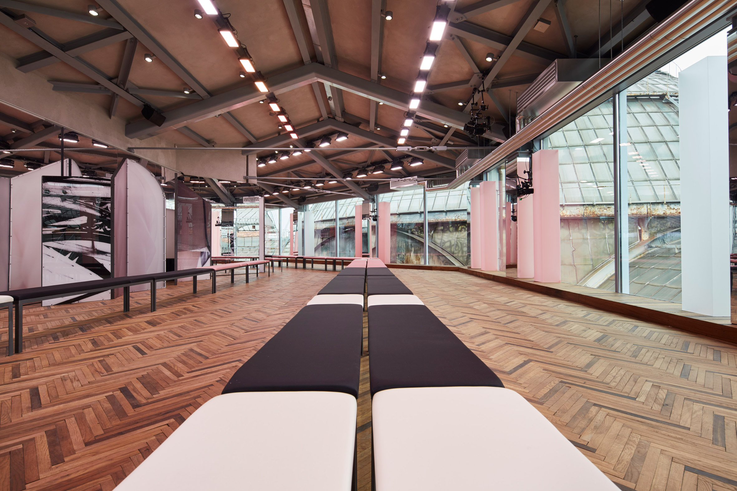 AMO uses mirrors and millennial pink to create a disorientating catwalk for Prada's debut Resort show-16