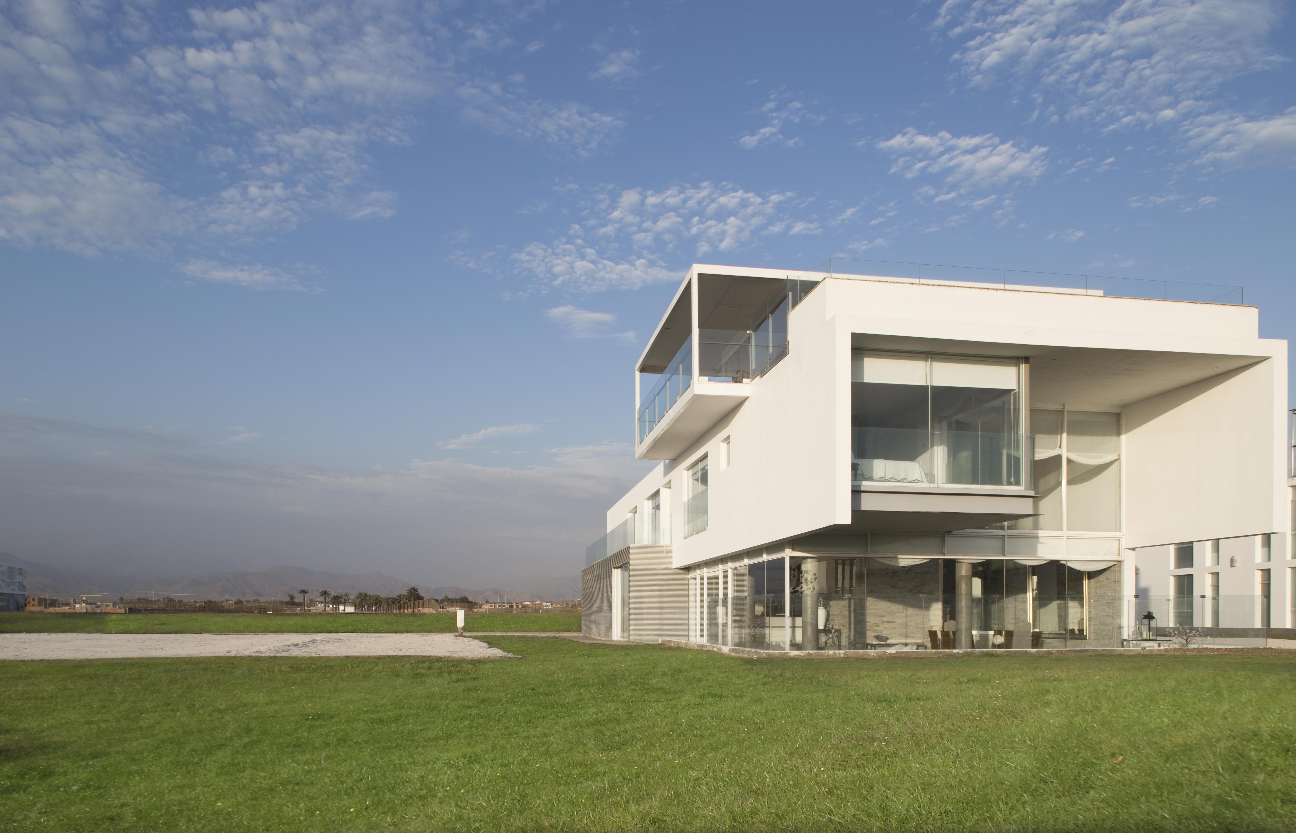 三立方体秘鲁海滩别墅 | 创新空间设计，三家庭共享和谐生活-45