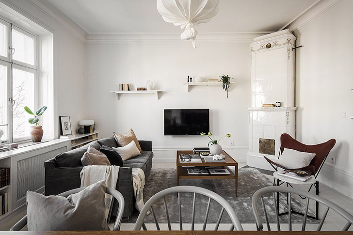 温馨暖色调的斯堪的纳维亚公寓设计-12