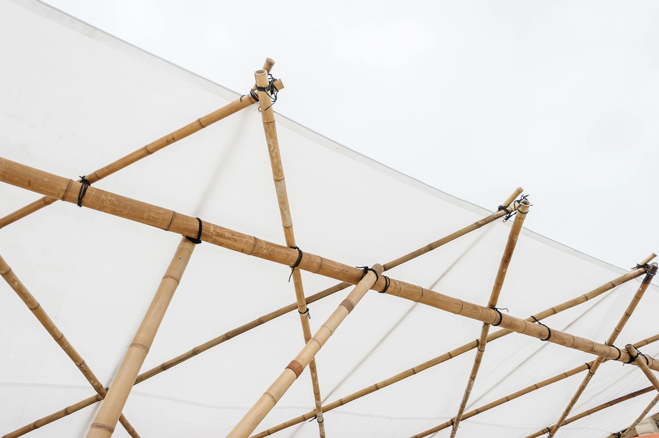 Textile bamboo structures for open-air events-33