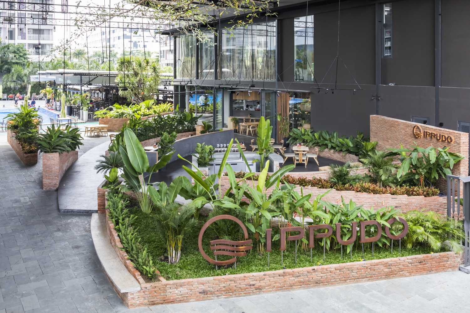 越南 IPPUDO 餐厅——绿植与木筷的多层空间叙事-36